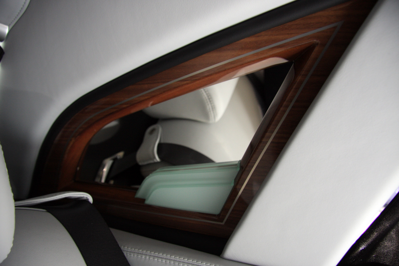 Illustration for article titled This $600K Rolls-Royce Has A City Carved Into Its Interior